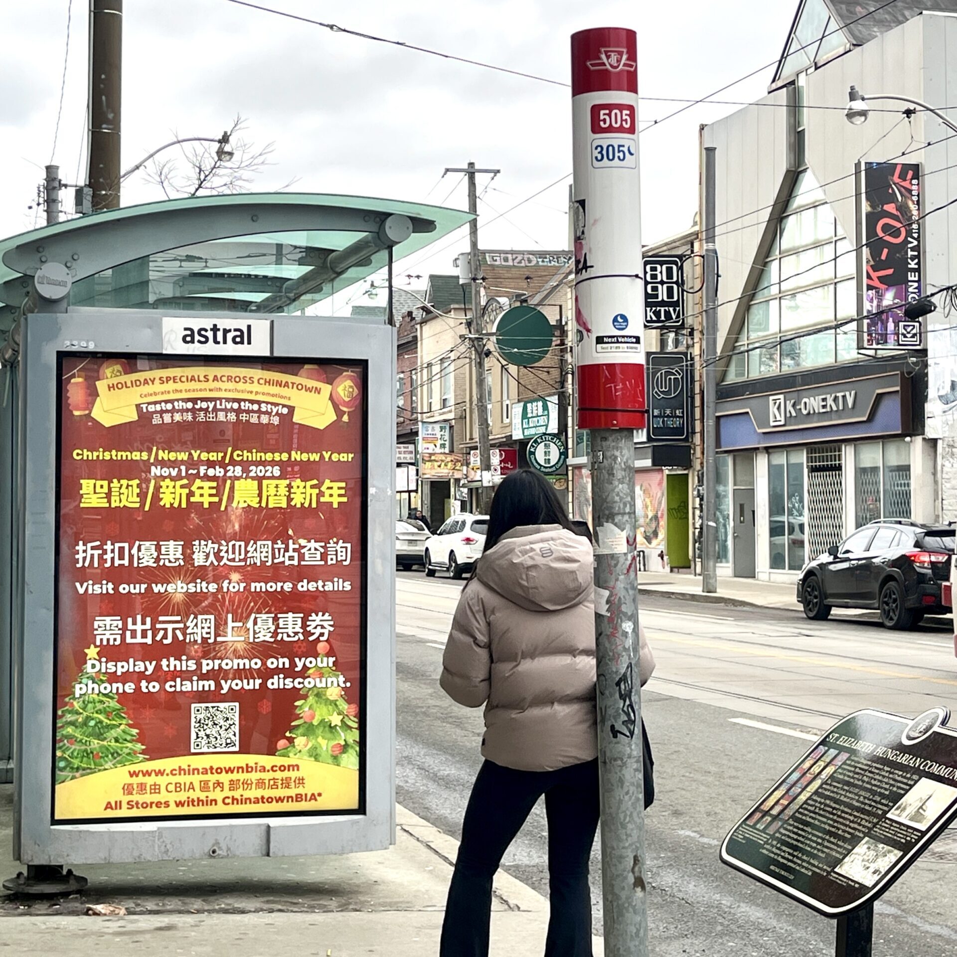 Advertising display at a bus shelter in Chinatown